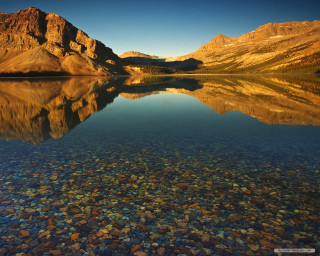 Mountain range reflection still lake 5 - a still lake free wallpaper