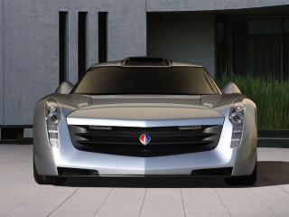 Silver sports car clock building - the front of the car free wallpaper