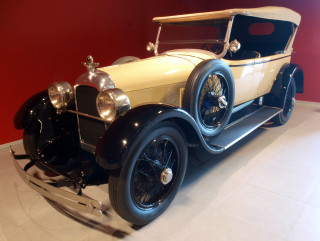 Vintage car museum exhibit red - an art deco sculpture free wallpaper