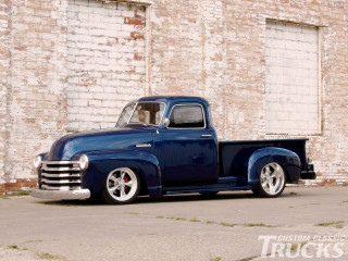 Blue truck brick building open - matte finish free wallpaper