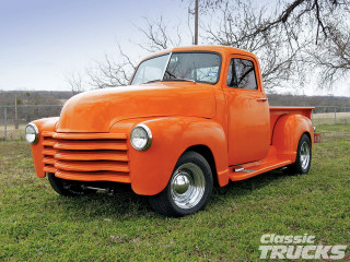 Orange truck parked field grass - cleve gray free wallpaper