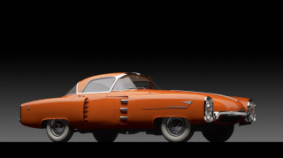 Orange car black background white 4 - an orange car free wallpaper