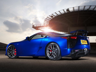 Blue sports car stadium sun - andrew law free wallpaper