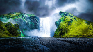 Waterfall mossy rock dark sky - a dark sky in the background free wallpaper