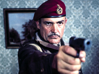 Man red beret pointing gun - a gun free wallpaper