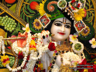 Statue woman flowers green headdress - a statue of a woman free wallpaper