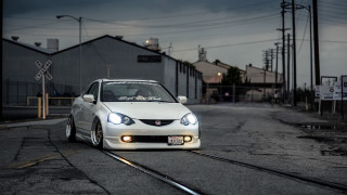 White car street train track - cornelisz hendriksz vroom free wallpaper