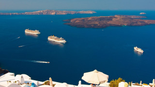 Cruise ships ocean small island - a small island in the background free wallpaper
