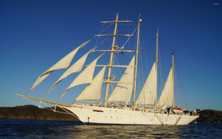 Large white sailboat sailing water - a body of water free wallpaper
