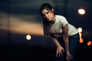 Woman posing dark hands hips - a picture in the dark free wallpaper