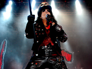Man leather outfit microphone guitar - a leather outfit holding free wallpaper