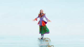 Woman colorful dress balancing wheel - david lachapelle free wallpaper