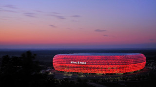 Large building red light night - a sky background free wallpaper for desktop