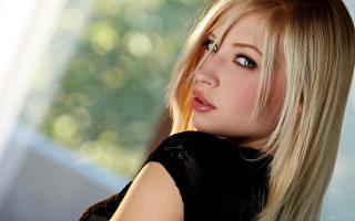 Blonde woman black top serious 2 - a black top free wallpaper