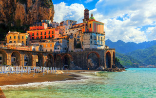 Beach buildings water mountains bridge - a bunch of buildings free wallpaper