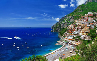 Beach boats hillside blue sky - a hillside free wallpaper