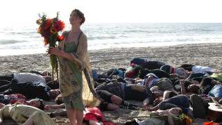 Woman holding flowers beach group - daphne fedarb free wallpaper