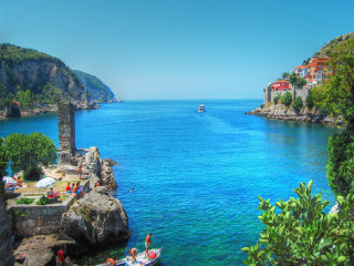 Boat cliff town beach people - a matte painting free wallpaper