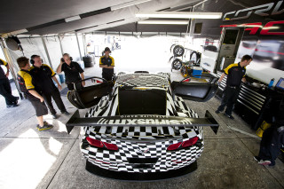 Car garage people man bike - a garage free wallpaper