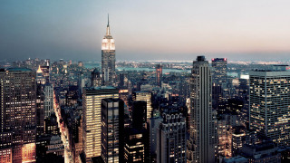 City skyline tall buildings nighttime 6 - a view of the city free wallpaper