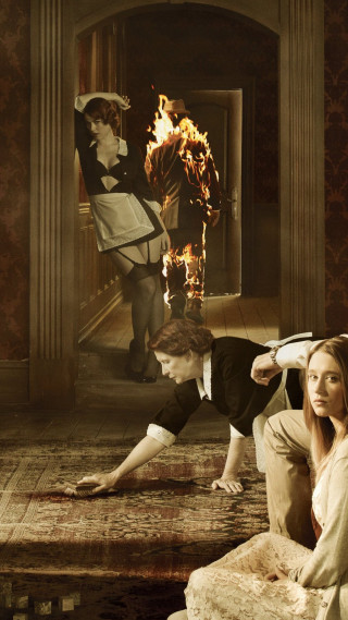 Woman man couch fire background - a woman and a man free wallpaper