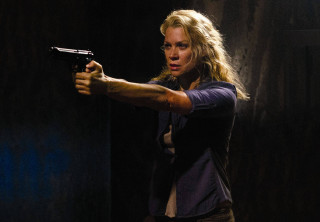 Woman holding gun dark room 5 - carey morris free wallpaper