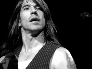 Man long hair vest singing - a microphone free wallpaper