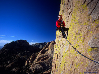 Man climbing mountain rope sky - side and a sky background free wallpaper
