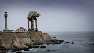 Giant robot statue cliff ocean - beeple free wallpaper