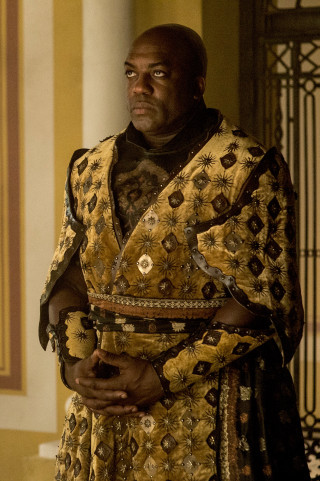 Man yellow black outfit building - regal free wallpaper
