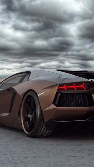 Brown sports car cloudy sky - matte finish free wallpaper