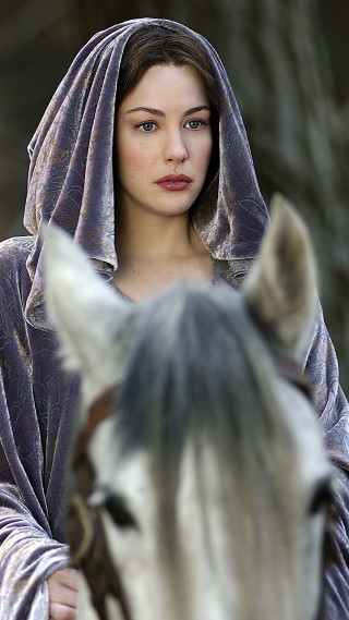 Woman hooded robe riding horse - the foreground free wallpaper