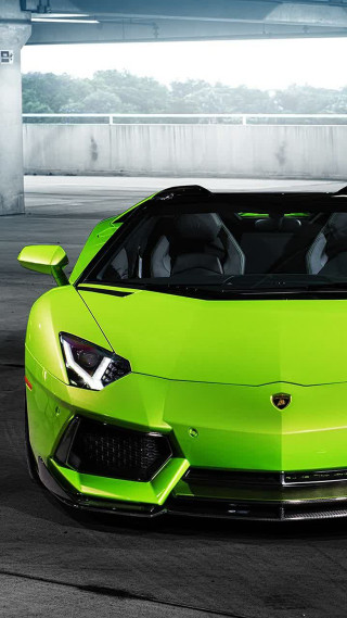 Green sports car parking garage 3 - a green sports car free wallpaper