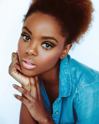 Woman blue shirt posing hands 2 - her chin free wallpaper
