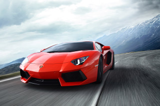 Red sports car driving road 16 - a road free wallpaper