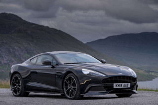 Black sports car mountain lake - a lake in the background free wallpaper