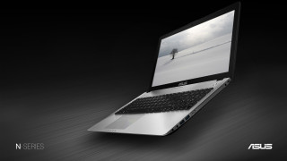 Laptop wooden table dark room - a wooden table free wallpaper