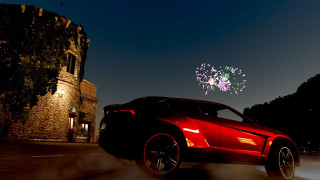 Red sports car castle night - a castle free wallpaper