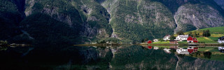 Mountain lake house reflection background - a mountain lake free wallpaper