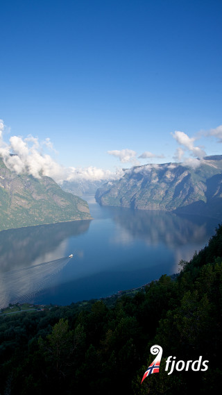 Lake mountains clouds boat water - the water below free wallpaper