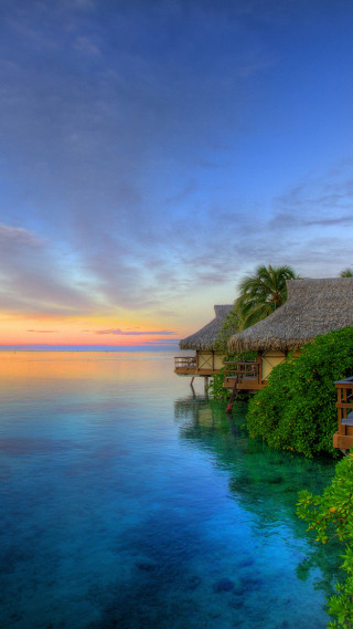 Tropical resort dock hut sunset - dawn free wallpaper