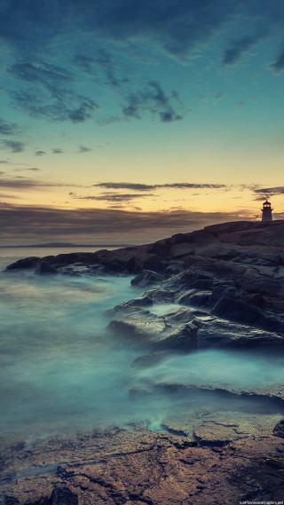Lighthouse rocky shore sunset water 7 - cinematic photography free wallpaper