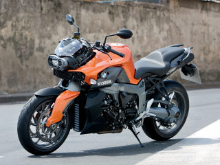 Motorcycle parked road concrete wall - a sign free wallpaper