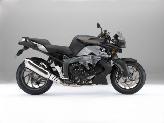 Black motorcycle parked white gray 2 - a black motorcycle free wallpaper