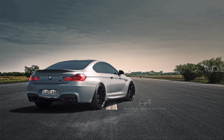 Silver car driving dark clouds - a dark sky in the background free wallpaper
