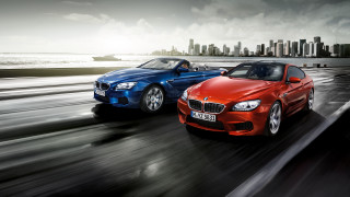 Two cars wet road ocean - vivid free wallpaper