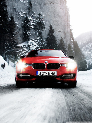 Red car snowy road mountain 2 - bright free wallpaper