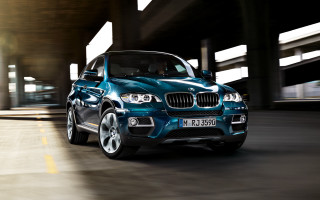 Blue bmw suv driving bridge 2 - a light free wallpaper