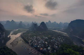 River valley mountains village cloudy - a sun setting free wallpaper