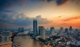 City skyline river bridge sunset - a bridge in the distance free wallpaper
